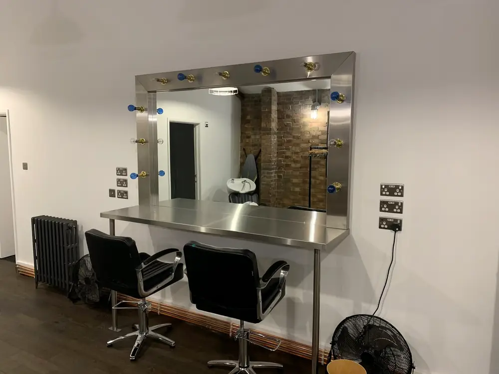 Stainless steel counters and a mirror frame, made for a salon