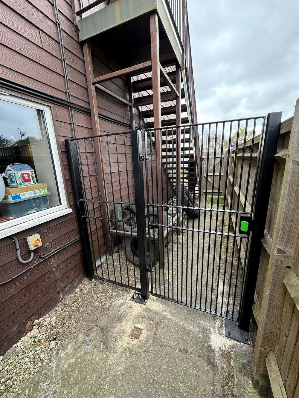 Slatted steel gates at a modern house