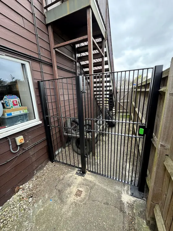 Slatted steel gates at a modern house